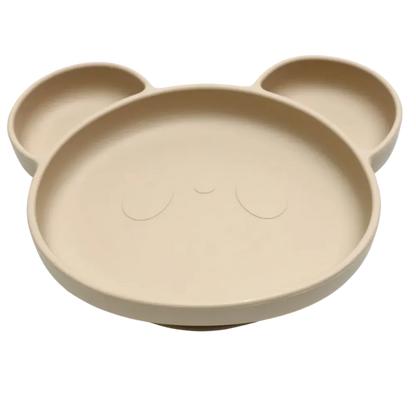 Assiette bebe ventouse beige sable au design minimaliste et épuré.