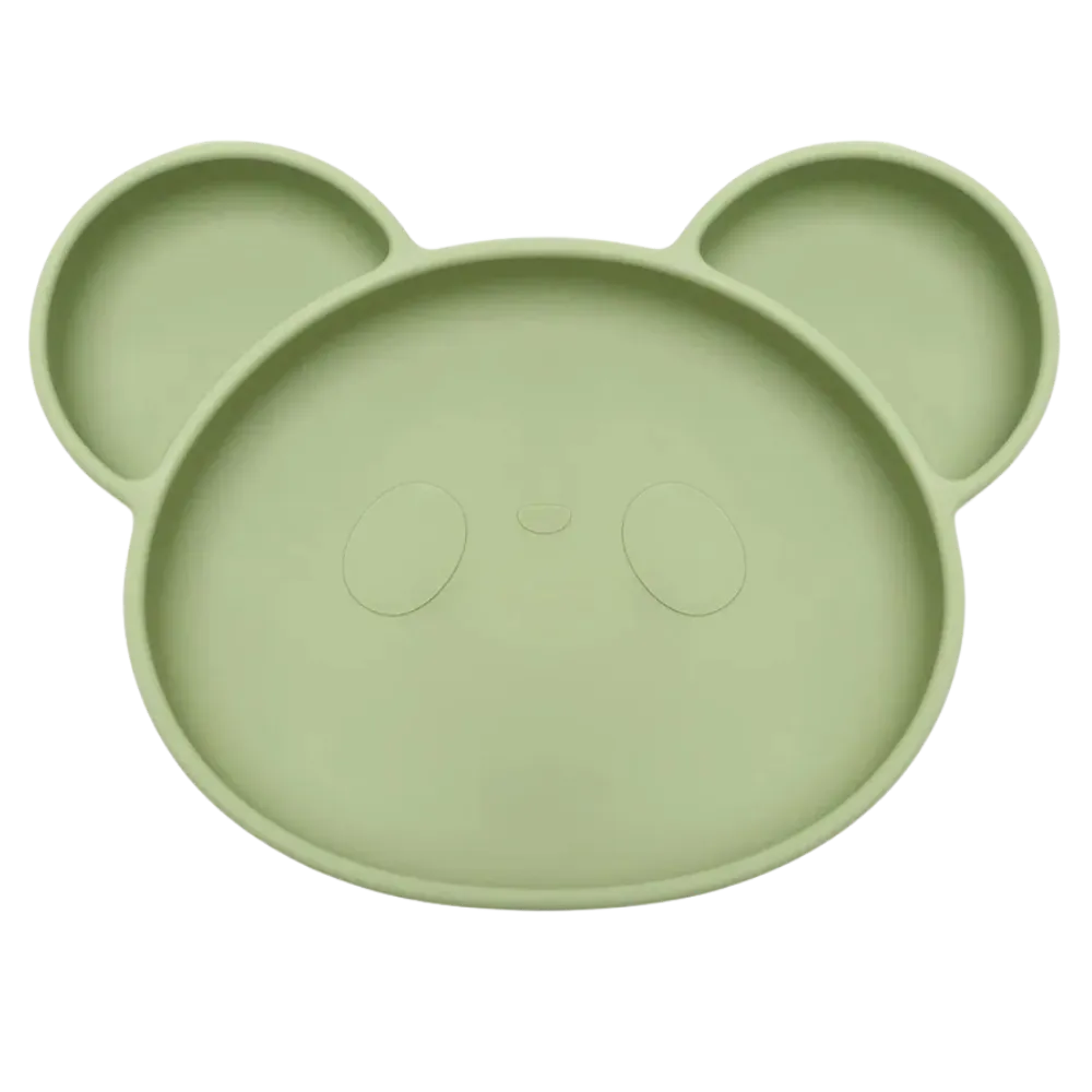 Assiette bebe en silicone souple vert clair pour premiers repas.