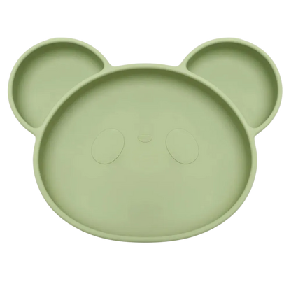 Assiette bebe en silicone souple vert clair pour premiers repas.