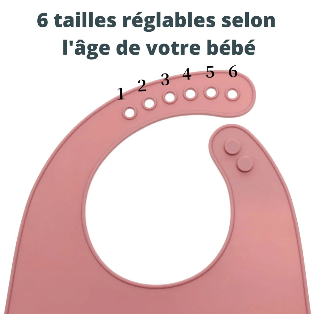 Bavoir rose bébé avec boutons réglables
