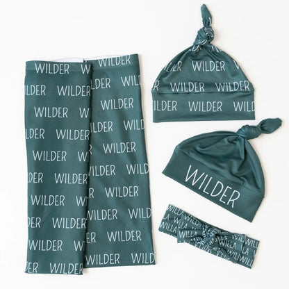 Emmaillotage bébé colique 2026 Vert Menthe, technique d'apaisement naturelle.