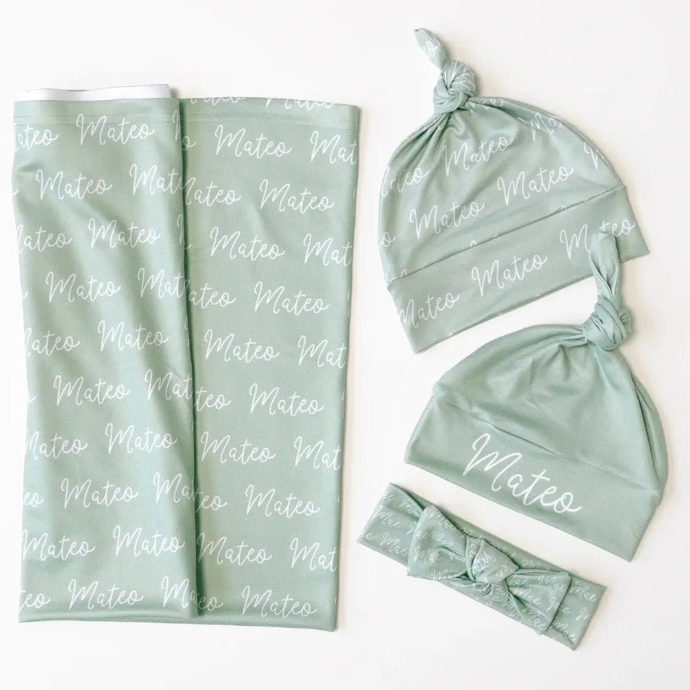 Lange d'emmaillotage 2026 Gris Sauge pour apaiser les coliques du nourrisson.